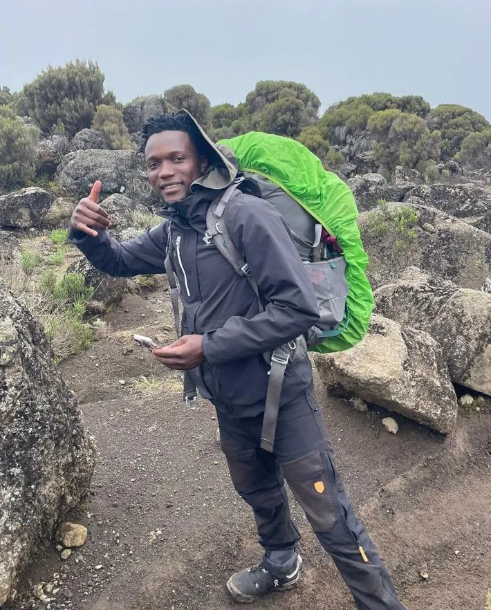 Tumaini Alfa Olotu, founder and lead guide, on the trail high on Kilimanjaro